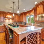 Gourmet,Kitchen,Boasts,A,Bar,Style,Kitchen,Island,With,Built-in